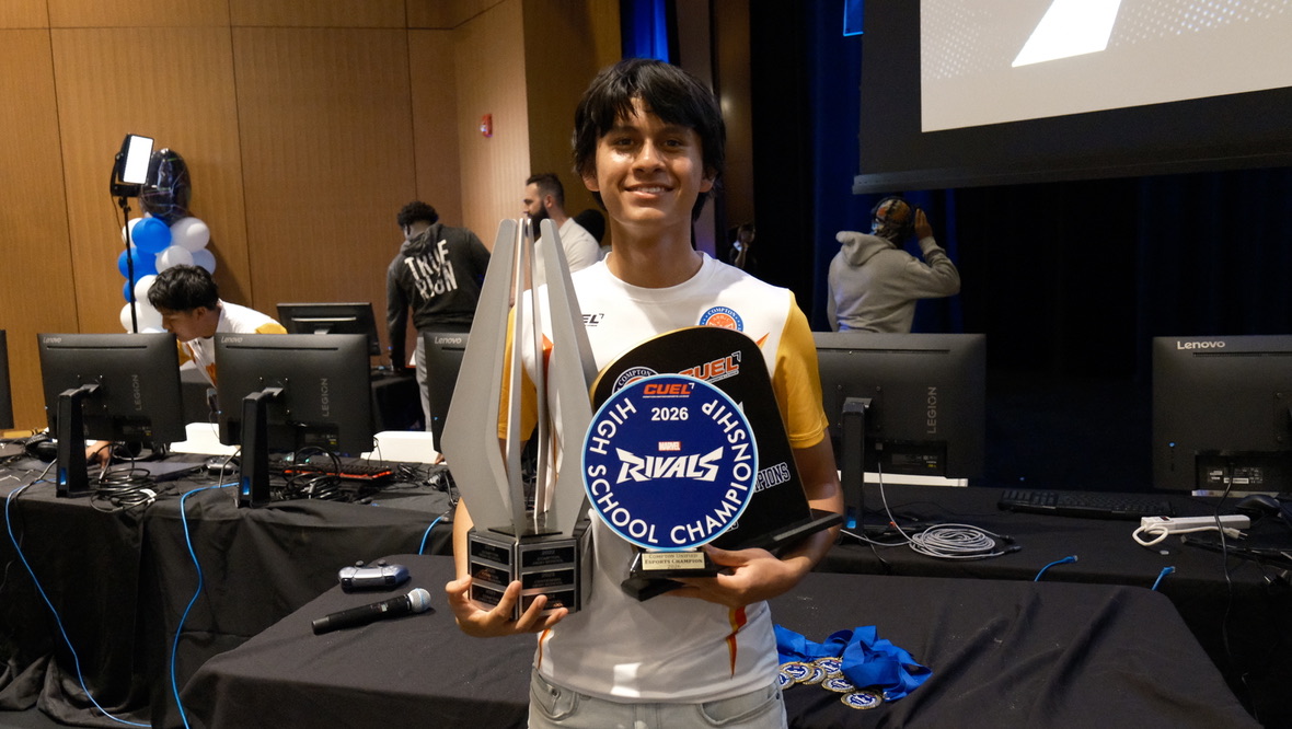 Student champion holding trophies at the Compton Unified Cup 2026 – High School Championship