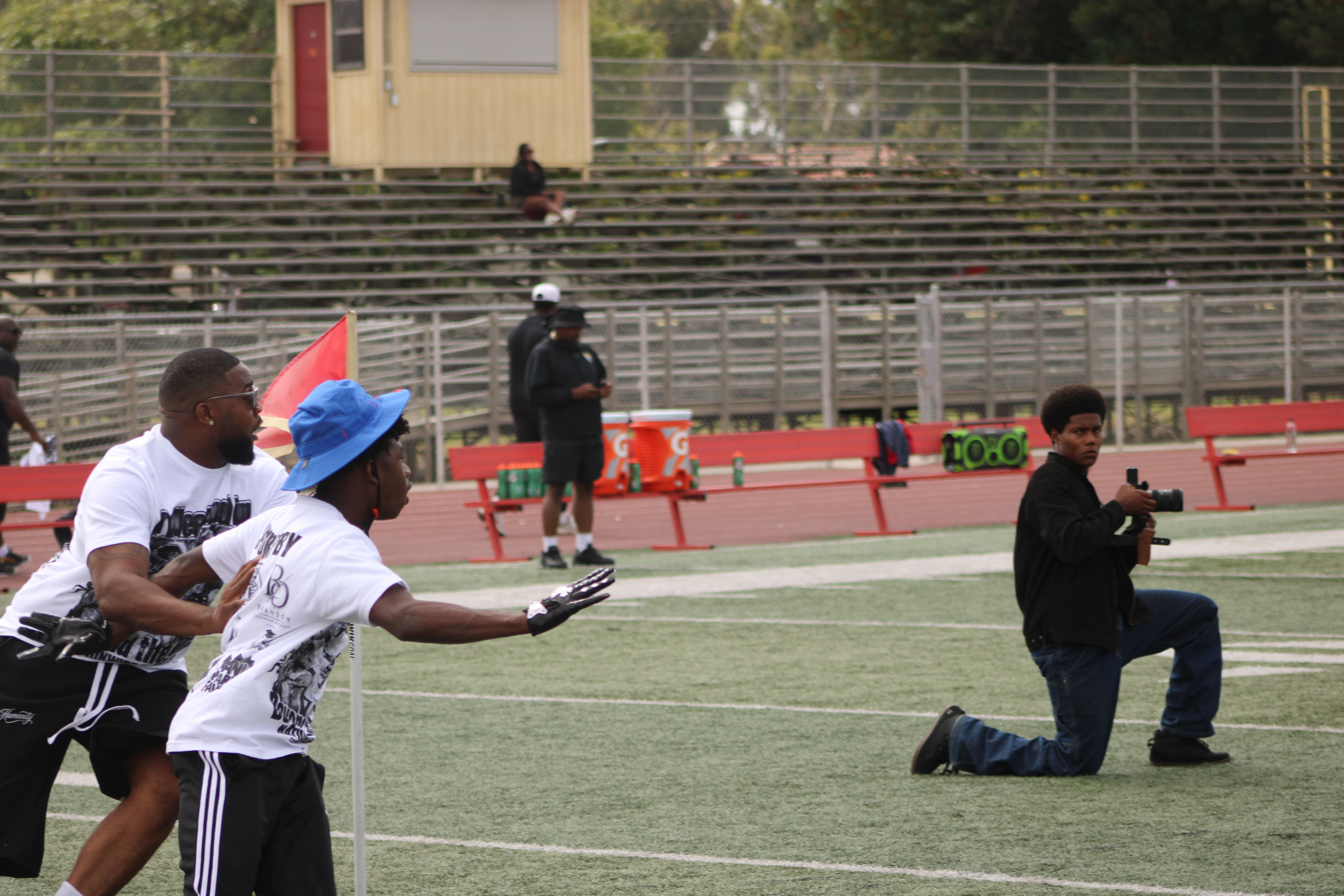 Coaches and young athletes during the football camp